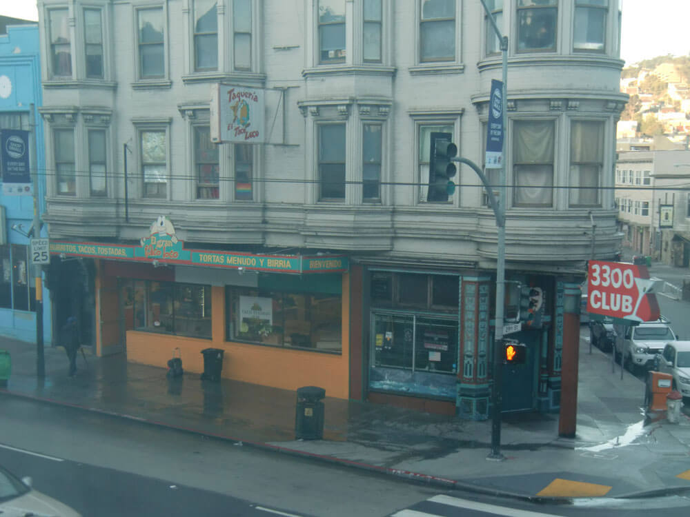 Early morning photo of the Taqueria El Taco Loco and the 3300 Club on Mission St, in San Francisco.